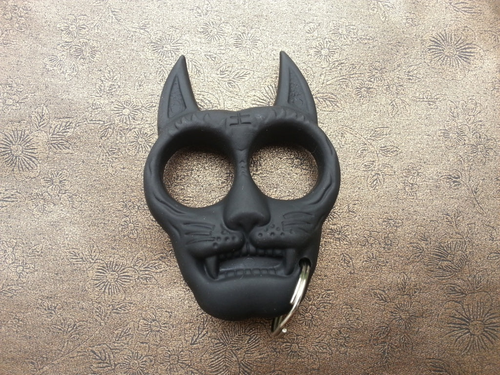 Бокс - тип ключодържател форма на куче черен метален с каучуково покритие.